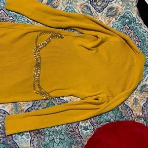 Turtle neck dress . Knee length.